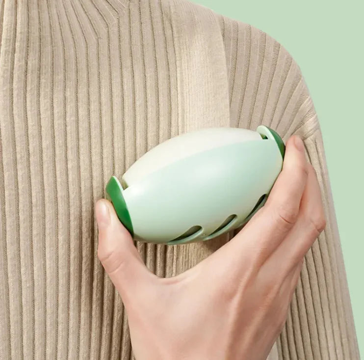 PetHair Pro reusable gel lint roller ball removing pet hair from clothing without sticky sheets
