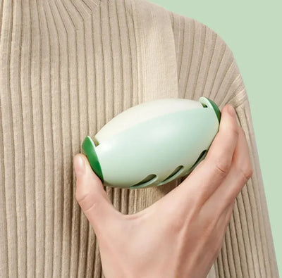 PetHair Pro reusable gel lint roller ball removing pet hair from clothing without sticky sheets
